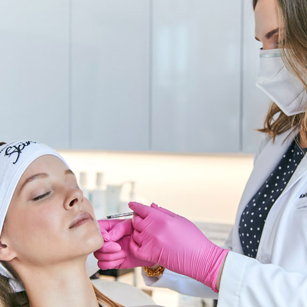 woman getting facial treatment